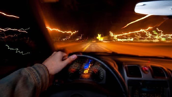 Blurred view of road from driver's perspective