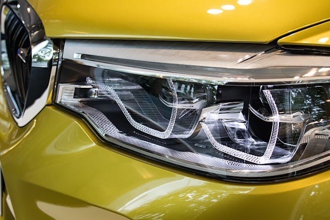 Yellow car with LED headlights