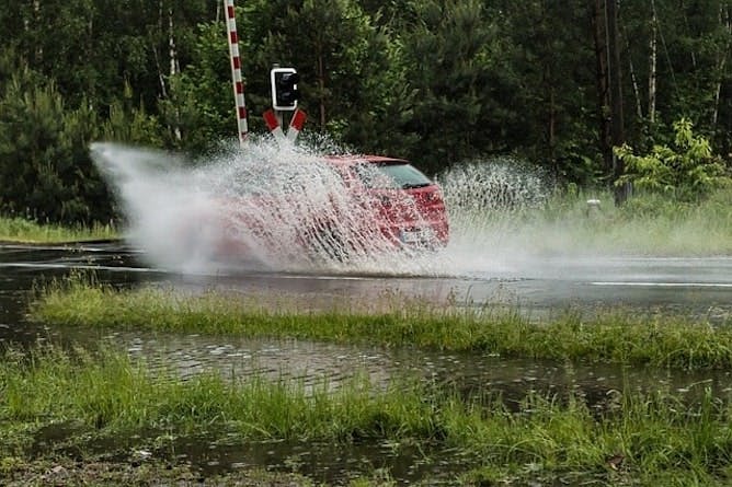 A car splashing though water