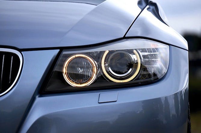 Car headlights illuminated