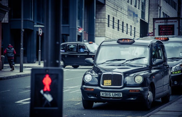 A queue of black cabs on the road