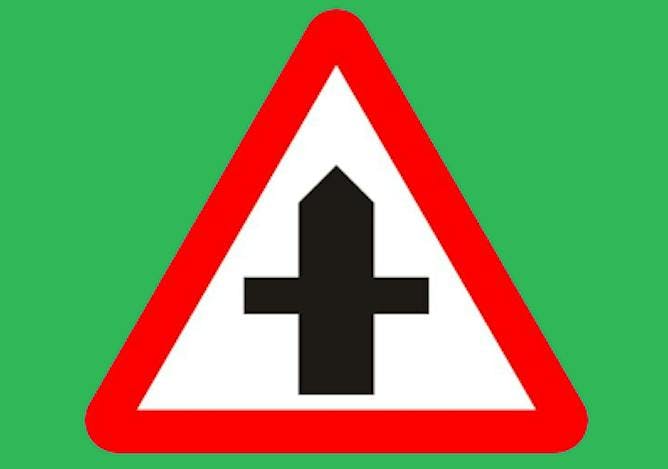 A crossroads ahead road sign
