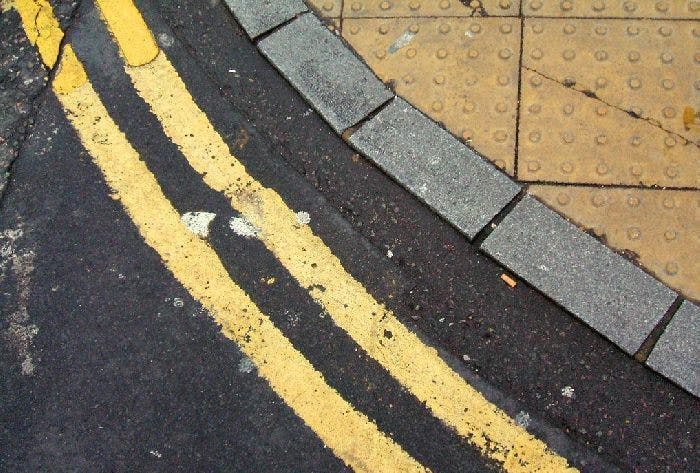 Double yellow lines on a curved road
