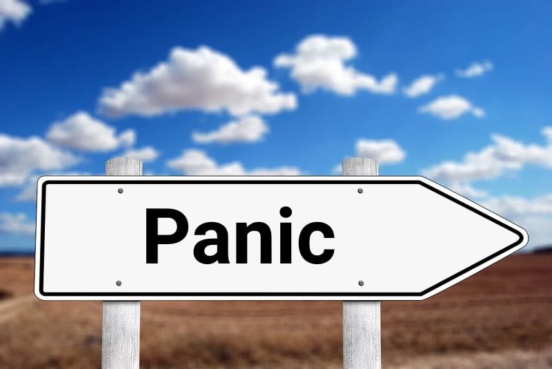 Direction sign with the word 'Panic'