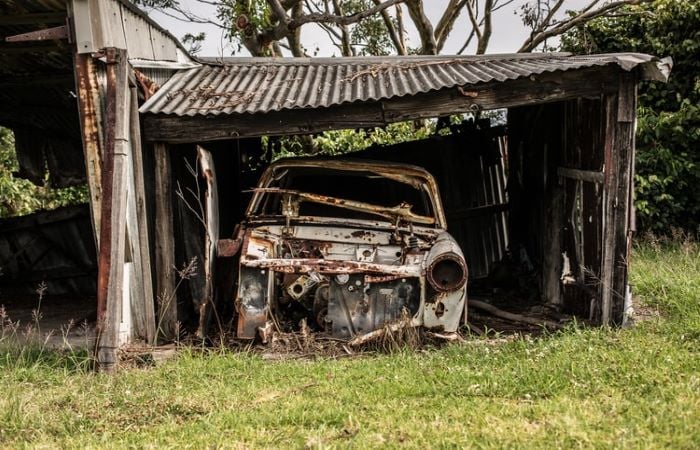 abandoned broken down farm car