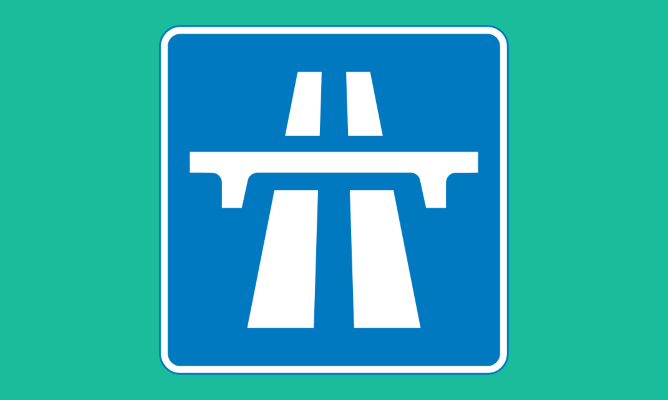 Motorway sign on green background