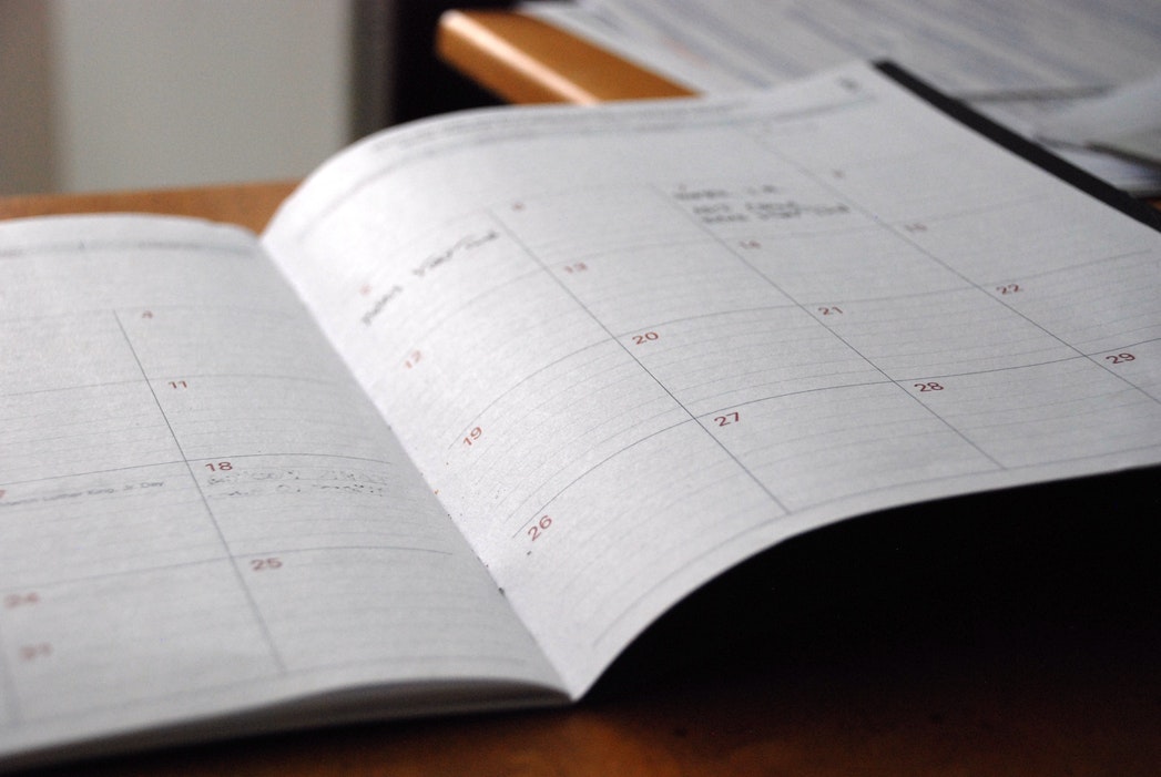Monthly planner open on desk