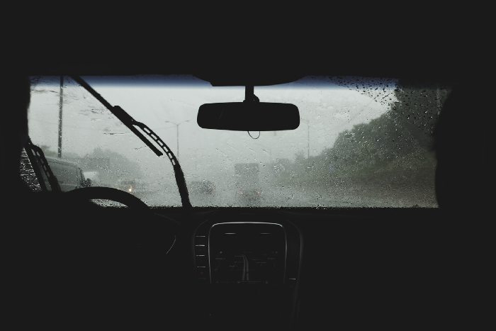 Windscreen view of rainy road